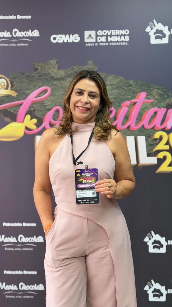 Lilianne Silveira com crachá no Confeitar Brasil 2026